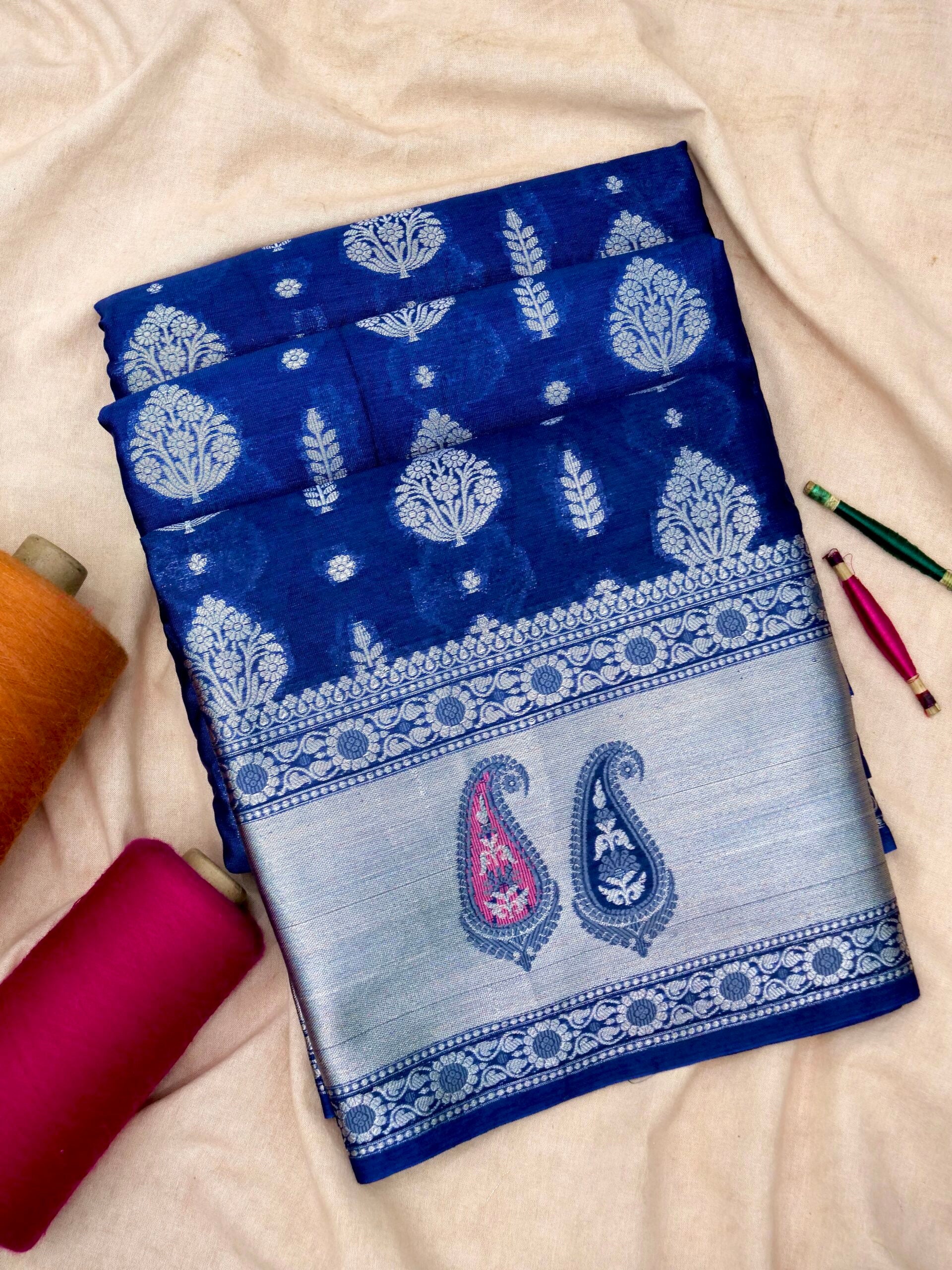 Navy Blue Warm Silk Saree With Big Silver Fancy Carry Buta