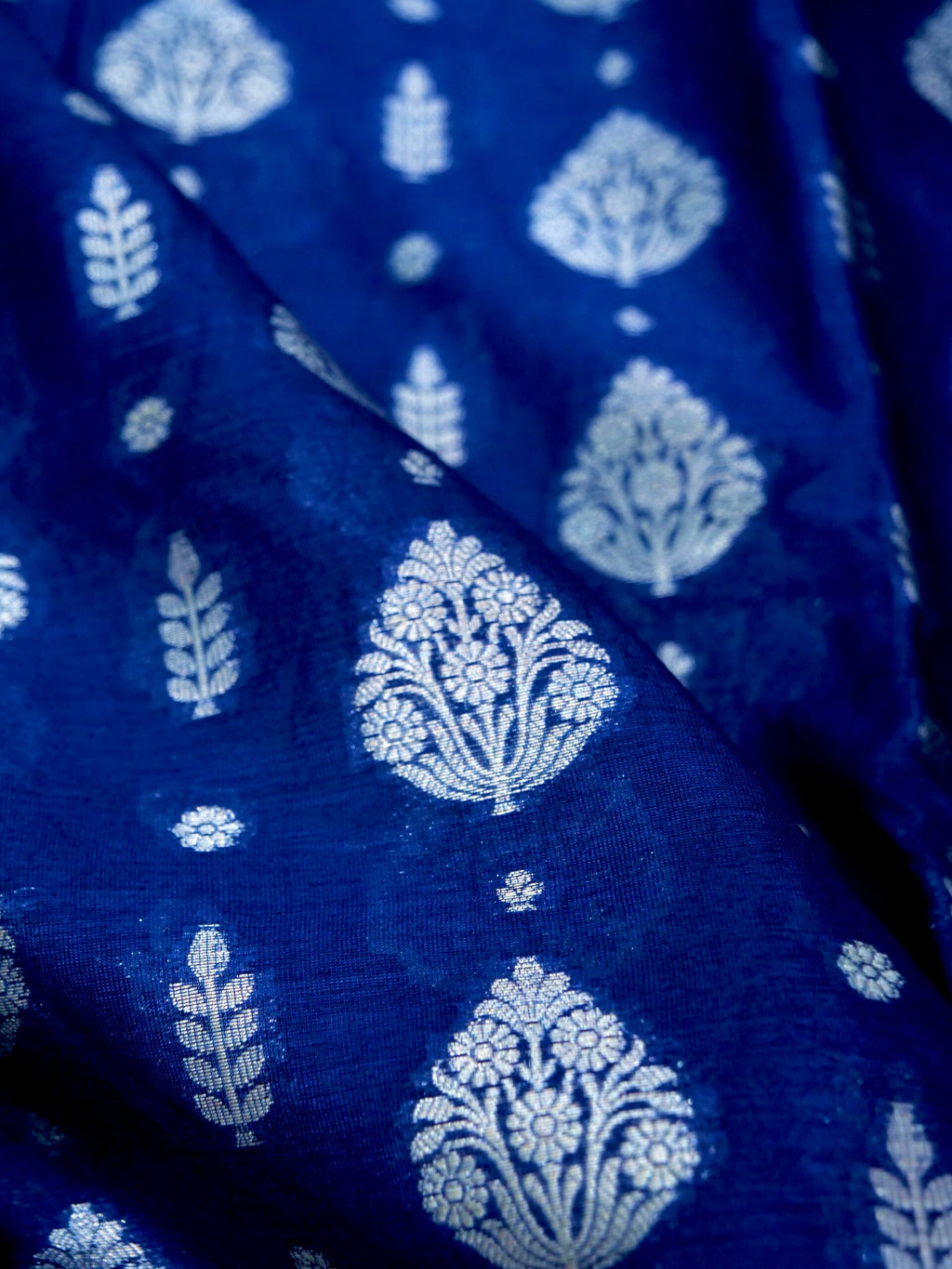 Navy Blue Warm Silk Saree With Big Silver Fancy Carry Buta
