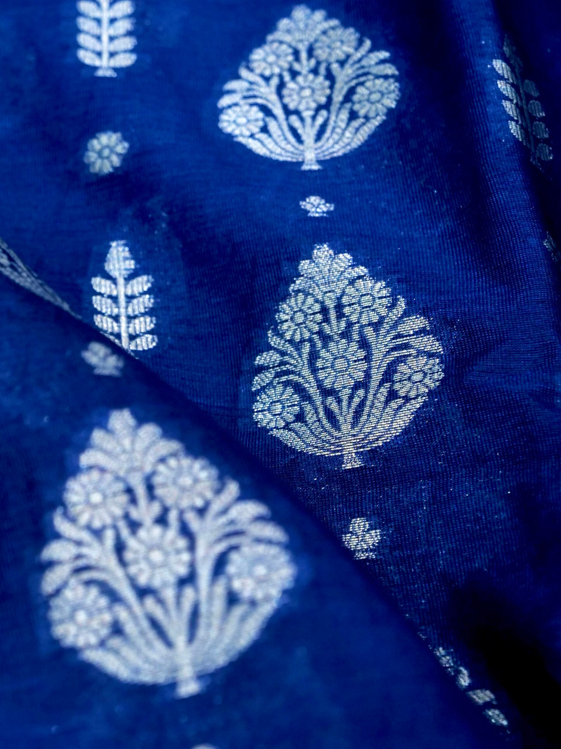 Navy Blue Warm Silk Saree With Big Silver Fancy Carry Buta