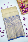 Ivory Tissue Kota Banarasi Silk Saree with Blue Zari Border & Zari Buti.