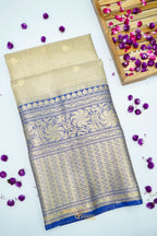 Ivory Tissue Kota Banarasi Silk Saree with Blue Zari Border & Zari Buti.