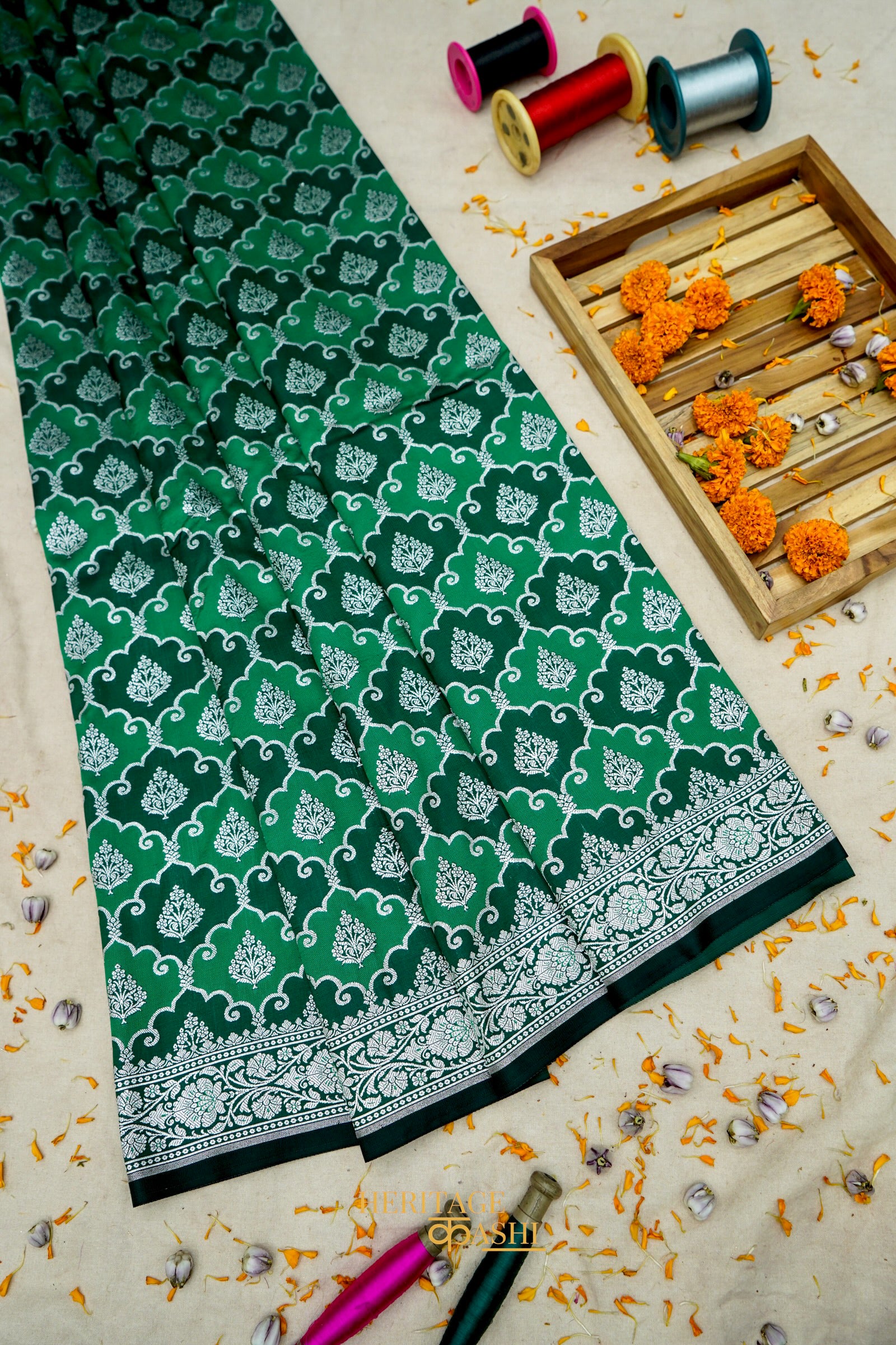 Emerald Green Rangkat Banarasi CEmerald Green Katan Rangkat Banarasi Silk Saree with Silver Zari Borderotton Saree with Silver Zari Border