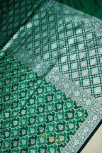 Emerald Green Rangkat Banarasi CEmerald Green Katan Rangkat Banarasi Silk Saree with Silver Zari Borderotton Saree with Silver Zari Border
