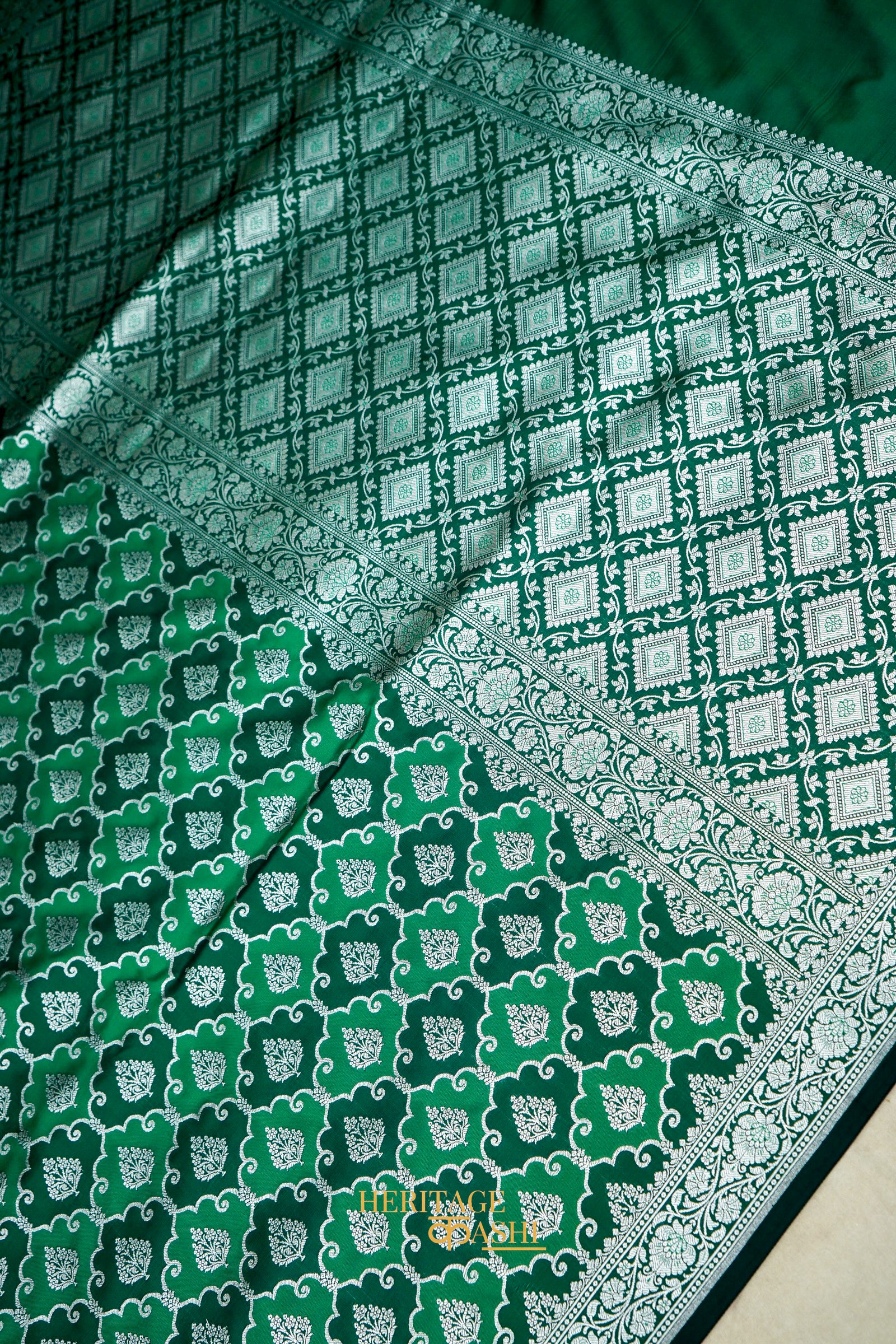 Emerald Green Rangkat Banarasi CEmerald Green Katan Rangkat Banarasi Silk Saree with Silver Zari Borderotton Saree with Silver Zari Border