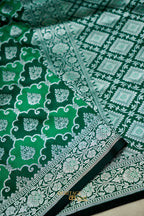 Emerald Green Rangkat Banarasi CEmerald Green Katan Rangkat Banarasi Silk Saree with Silver Zari Borderotton Saree with Silver Zari Border