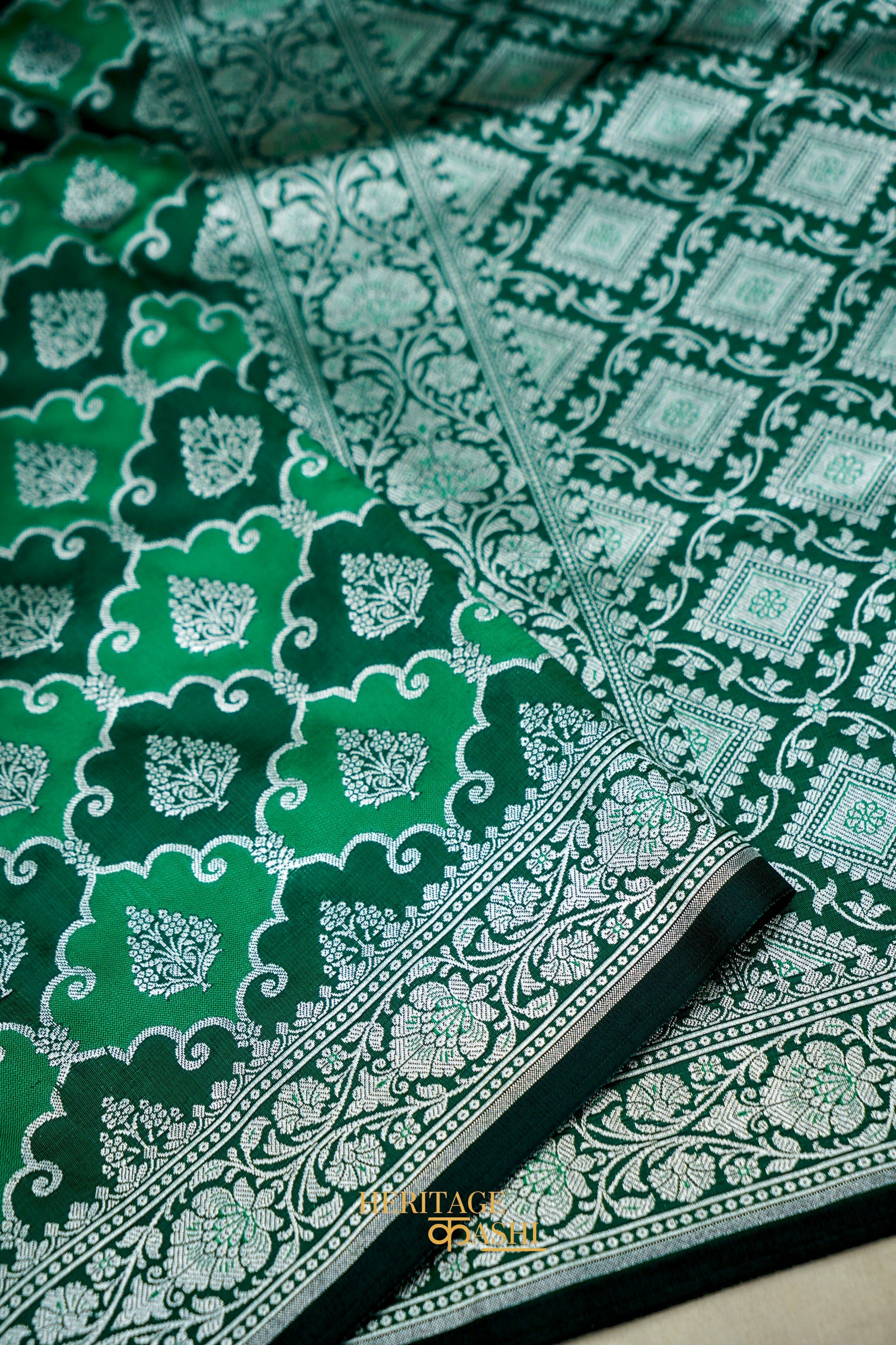 Emerald Green Rangkat Banarasi CEmerald Green Katan Rangkat Banarasi Silk Saree with Silver Zari Borderotton Saree with Silver Zari Border
