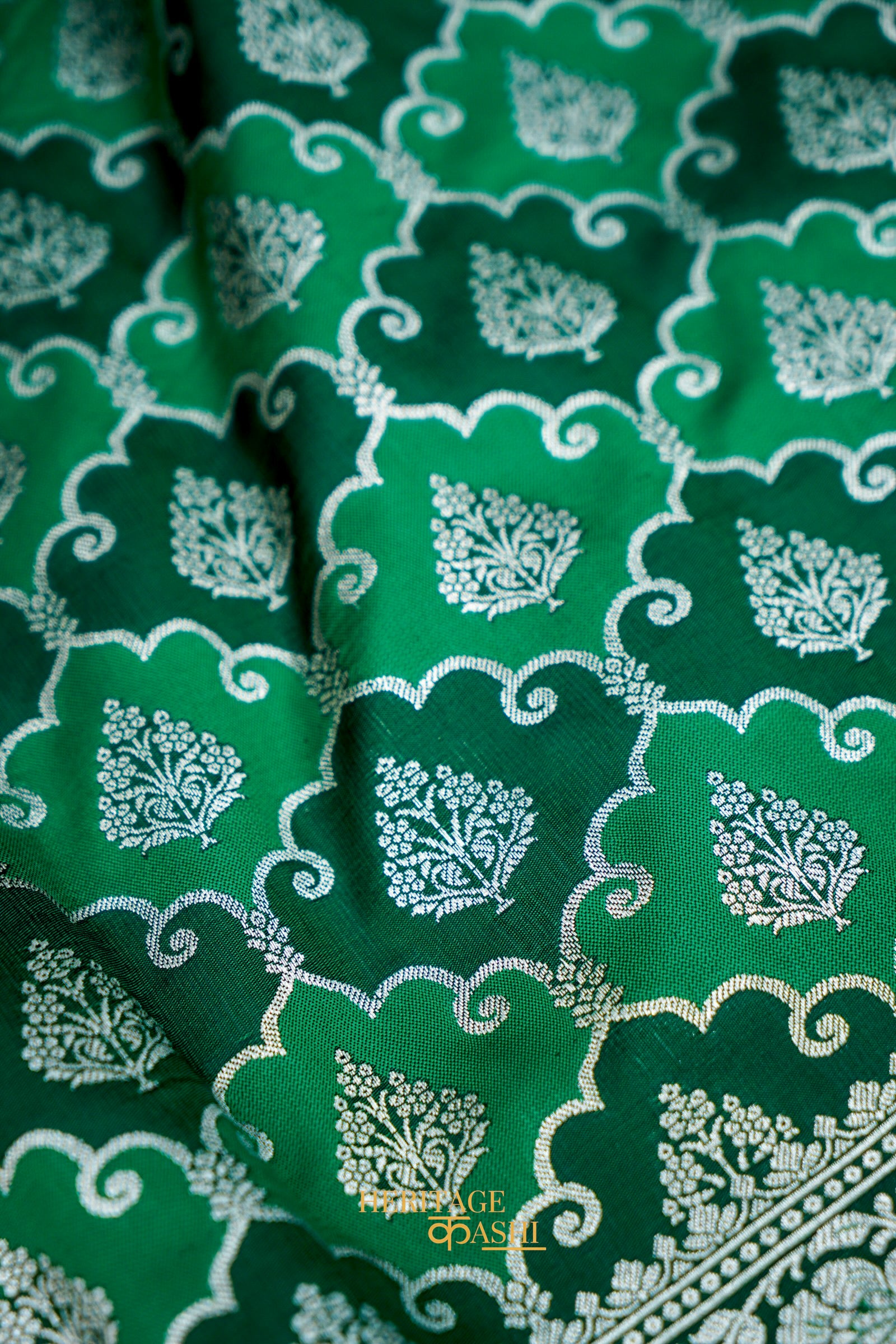 Emerald Green Rangkat Banarasi CEmerald Green Katan Rangkat Banarasi Silk Saree with Silver Zari Borderotton Saree with Silver Zari Border