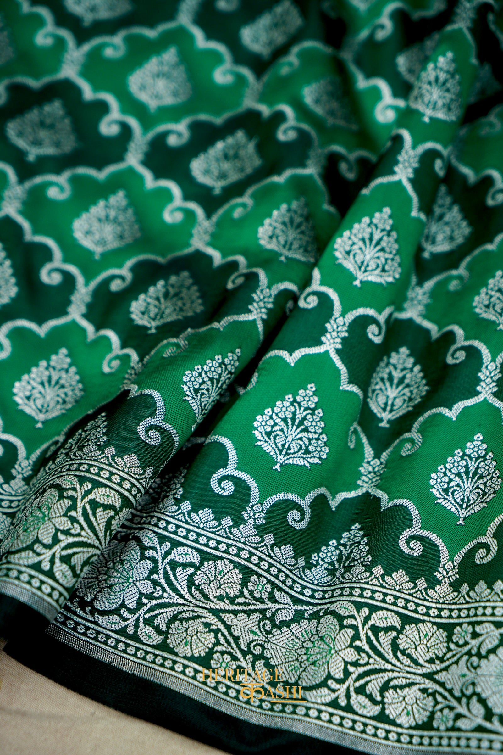 Emerald Green Rangkat Banarasi CEmerald Green Katan Rangkat Banarasi Silk Saree with Silver Zari Borderotton Saree with Silver Zari Border