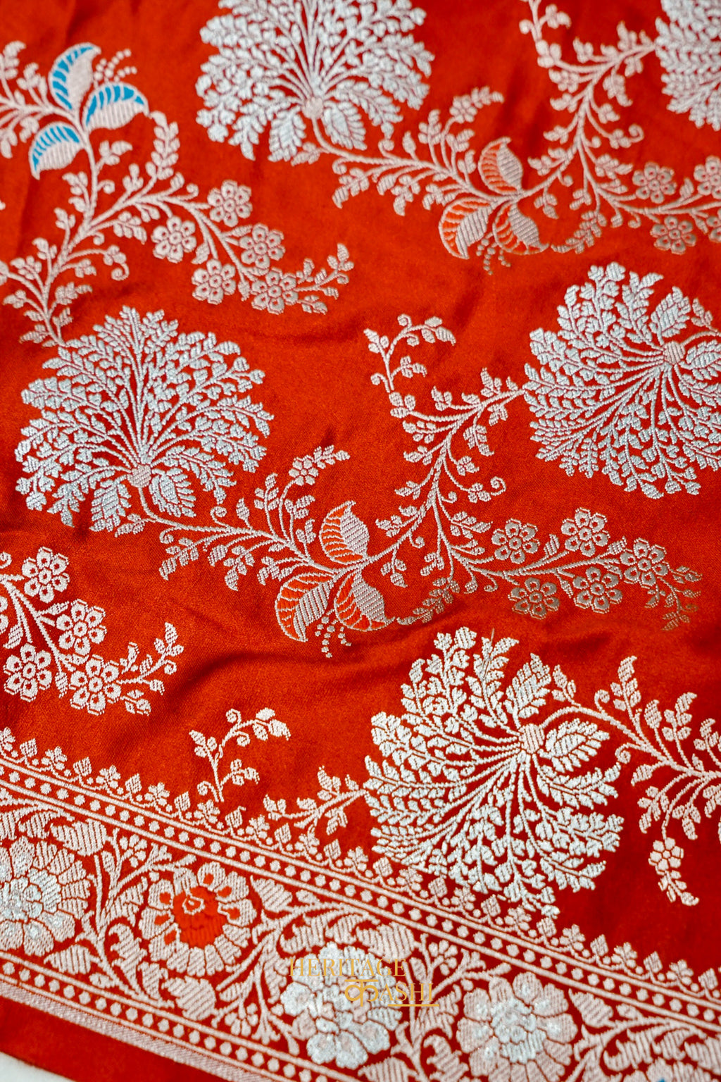 Rust Orange Mashru Multicolour Floral Jaal Motif Silk Saree