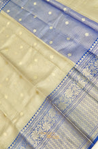 Ivory Tissue Kota Banarasi Silk Saree with Blue Zari Border & Zari Buti.