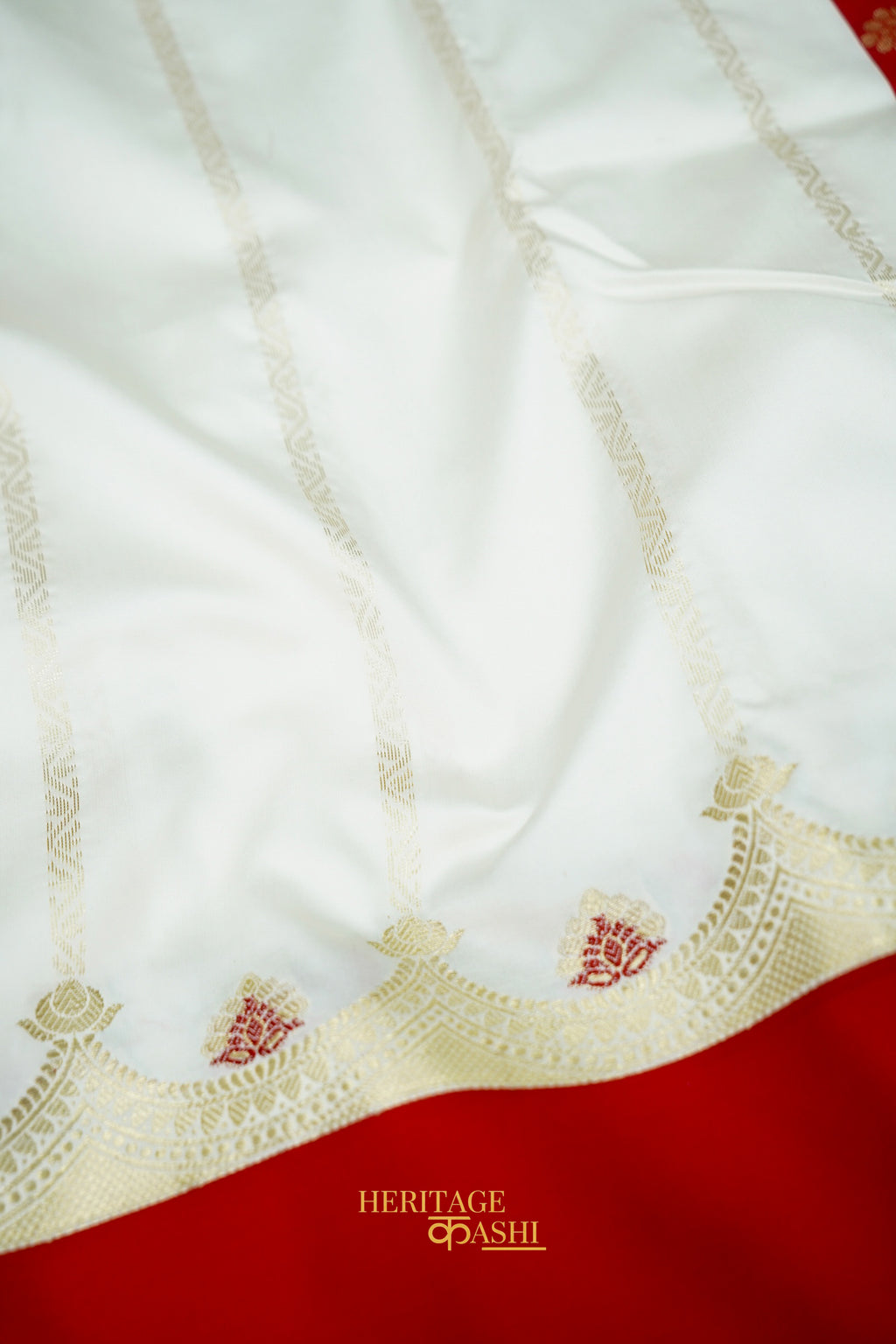 Off White Katan Saree with Rich Red Crown Zari Border